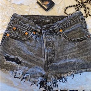 Levi’s 501 black distressed denim shorts